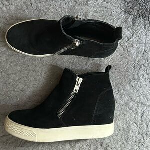 Black high platform zip up shoes